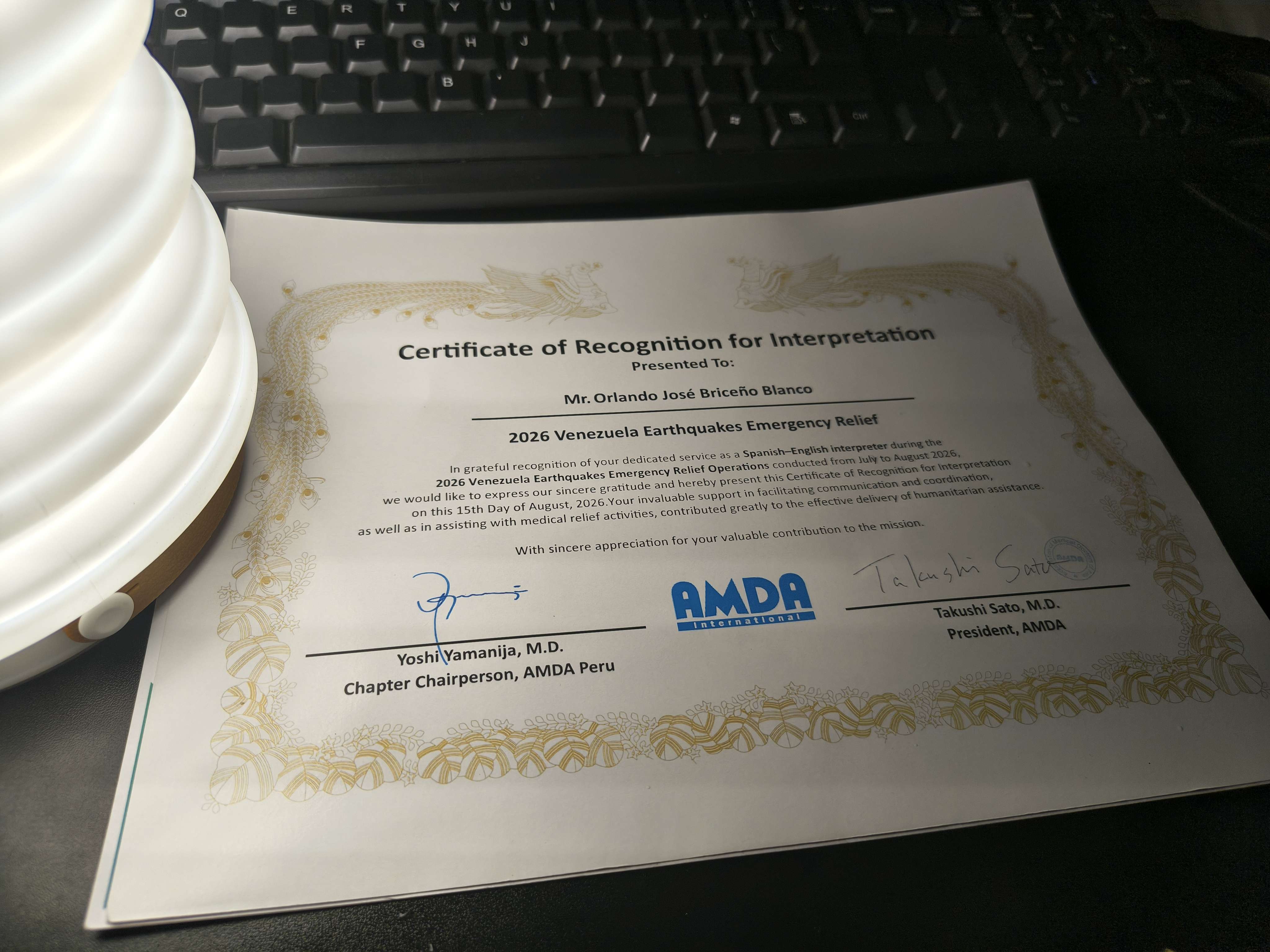 AMDA certificate of recognition presented to Orlando Briceño