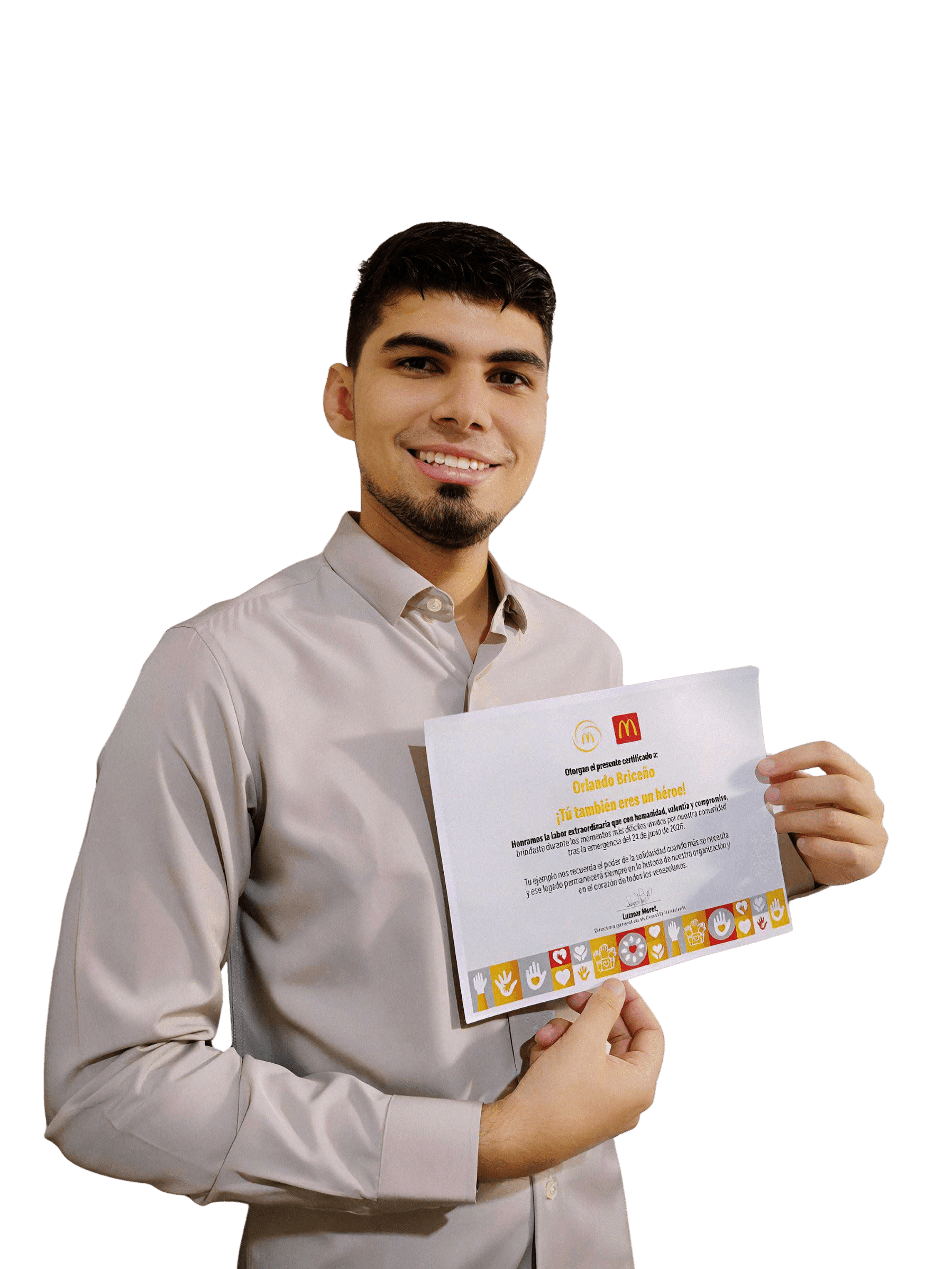 Orlando Briceño holding his McDonald's recognition